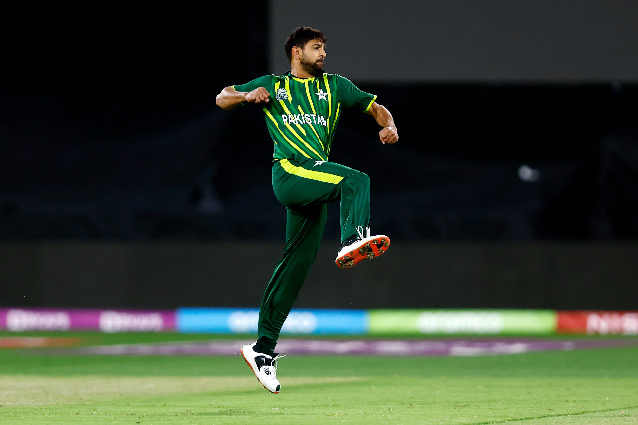 Pakistan's Haris Rauf celebrates the dismissal of India's skipper Rohit Sharma