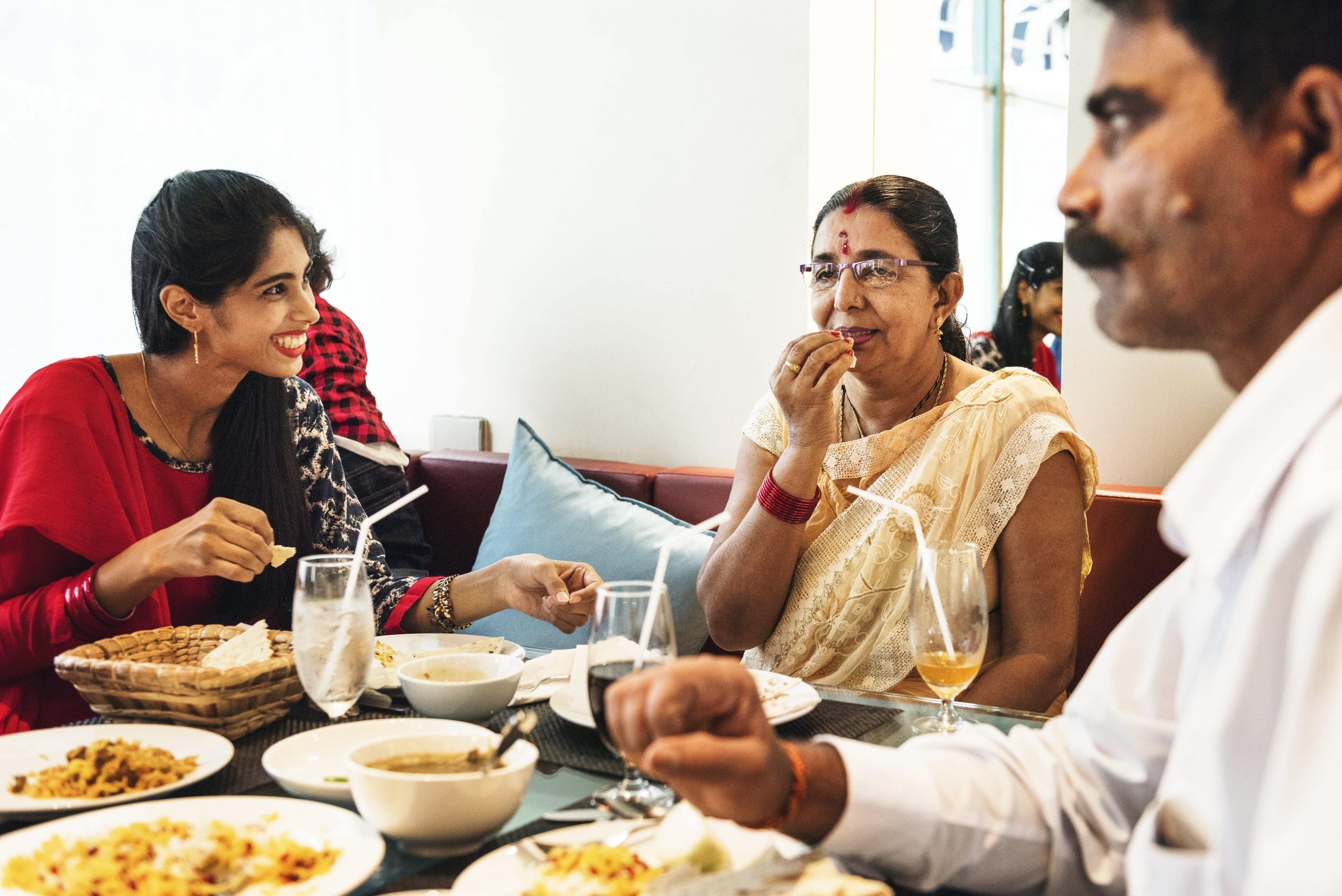 ws_happy-indian-family-having-indian-food-2022-12-16-01-26-59-utc-min-min