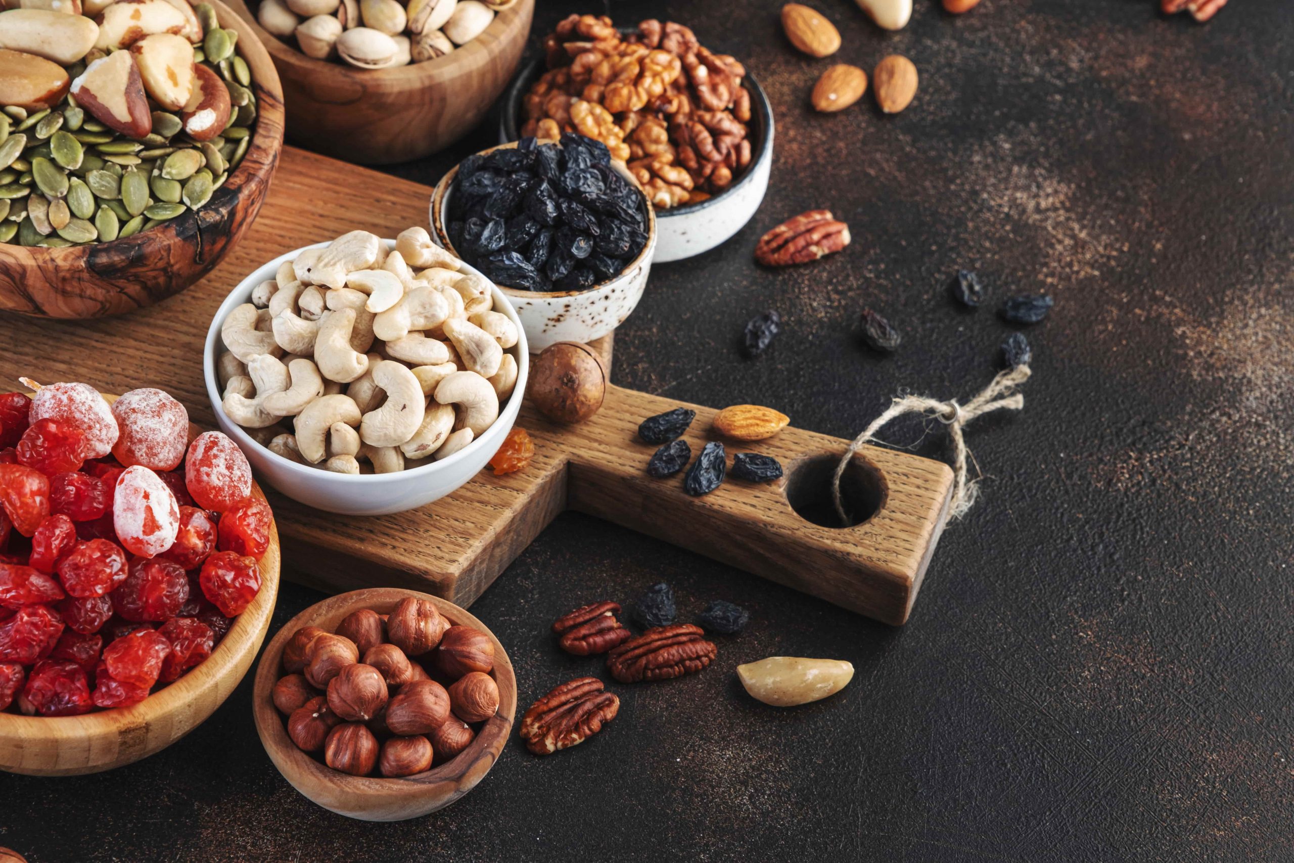 ws_dried-fruits-nuts-in-bowls-set-dry-apricots-figs-2022-01-11-05-12-48-utc-min