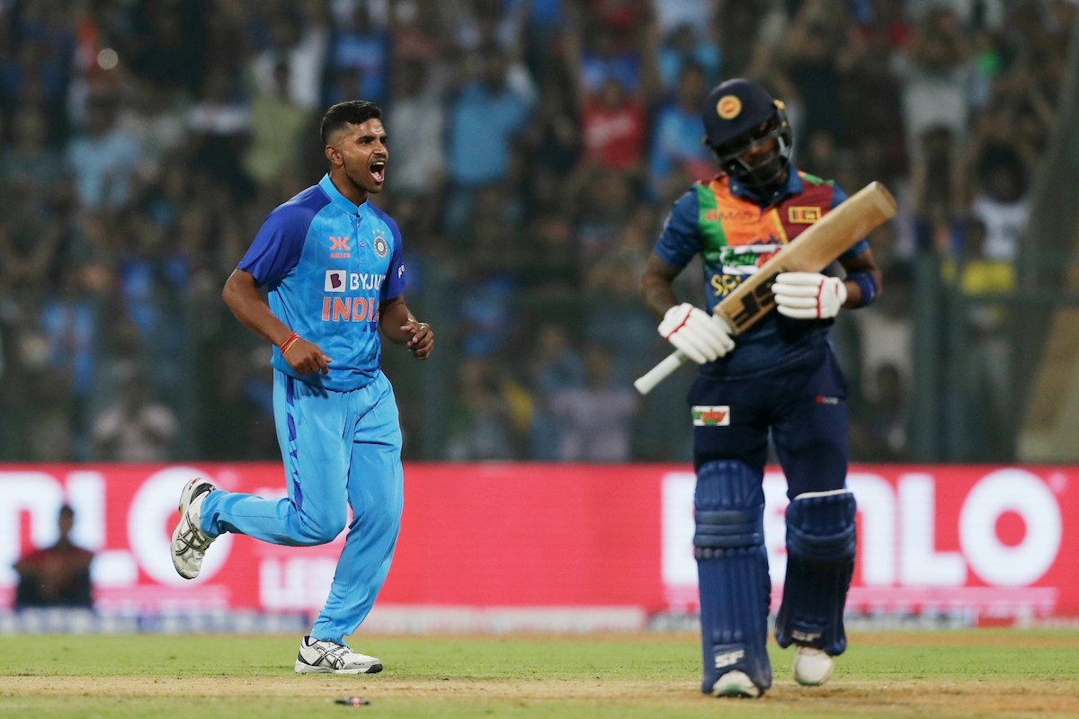 Shivam Mavi celebrates a dismissal