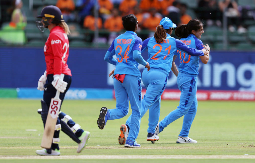 Indian players celebrate a wicket
