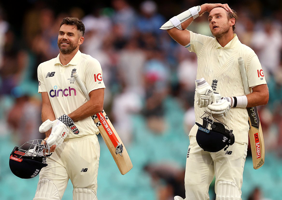 England's James Anderson and Stuart Broad walk off after the match ended in a draw