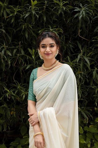 Image of Indian Beautiful Young Girl Wearing Traditional Sari Making Flower  Rangoli For Diwali Or Onam Or Pongal Festival,Studio Shot With Extra Copy  Space.-AR594309-Picxy