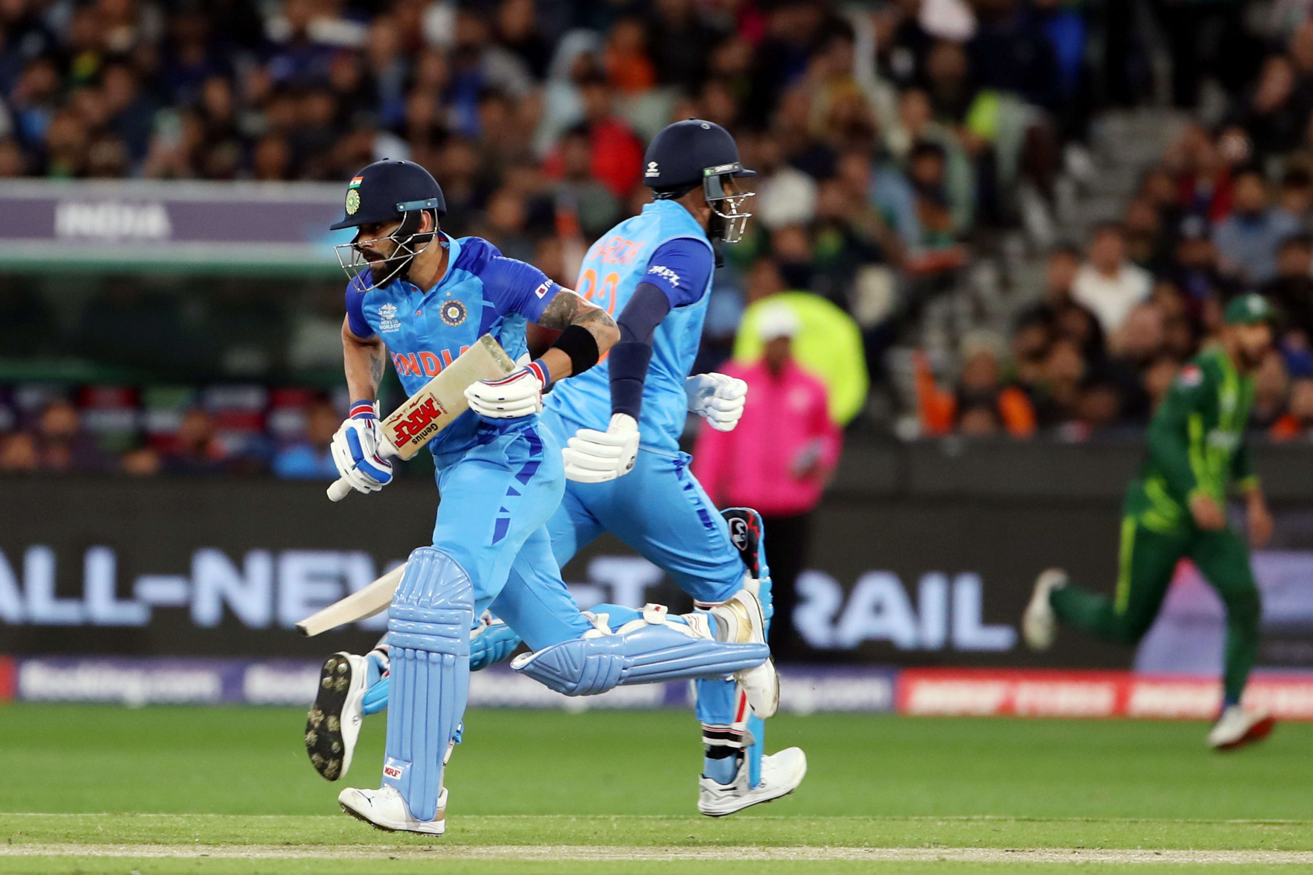 India's Virat Kohli and Hardik Pandya run between the wickets