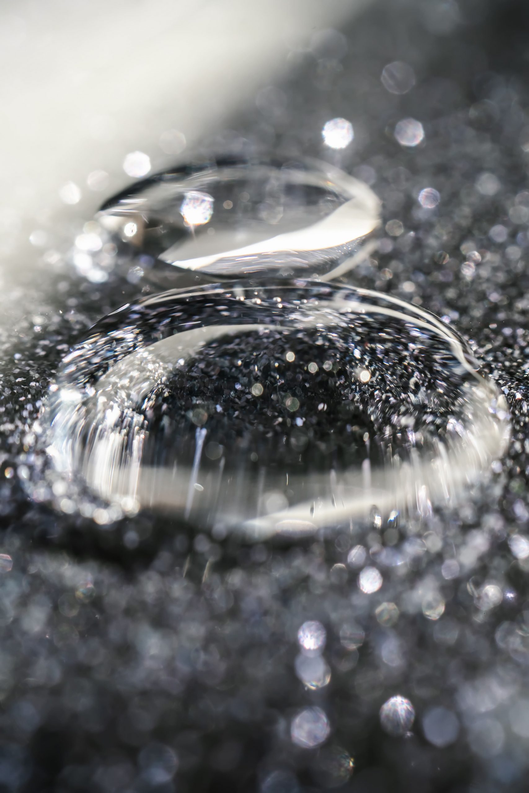 a-drop-of-cosmetic-gel-on-a-black-shining-backgrou-2022-01-27-15-52-20-utc