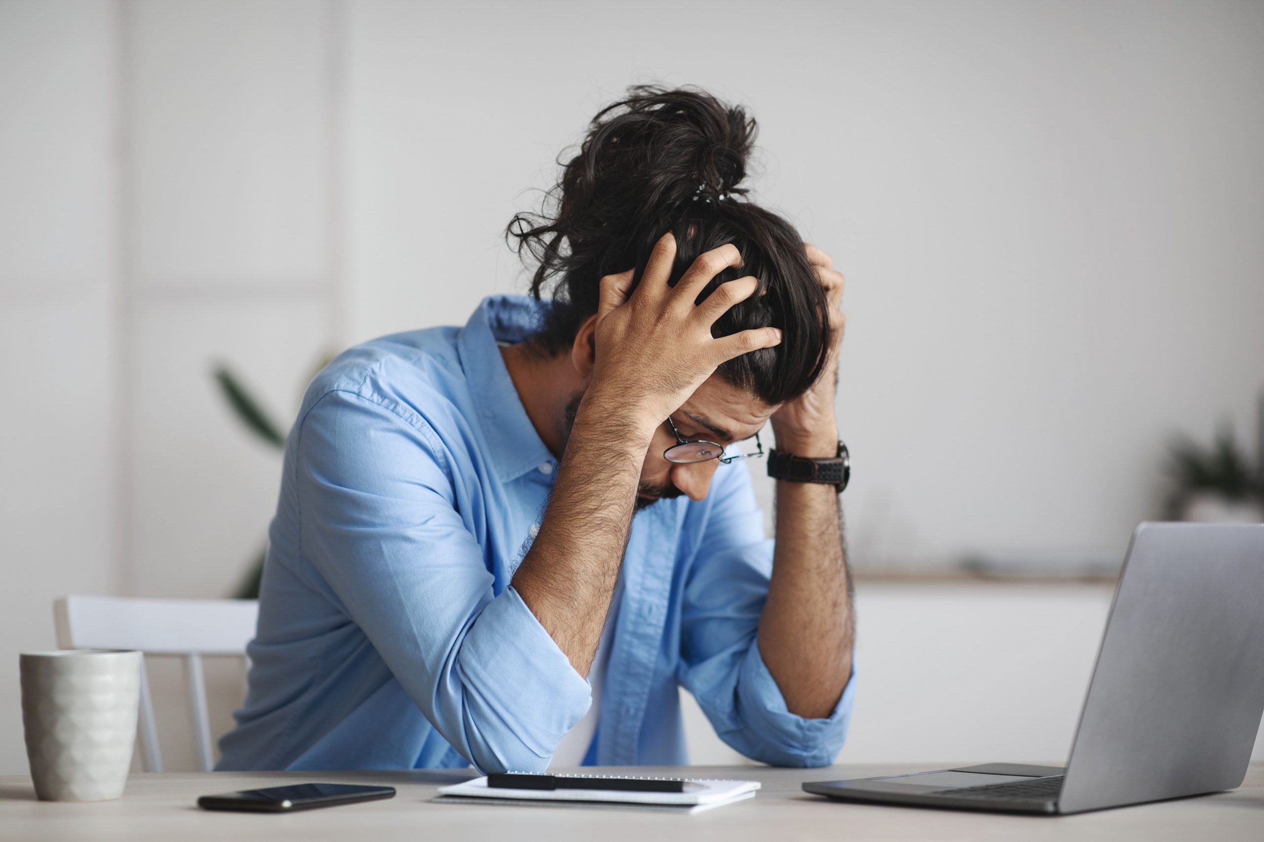 work-problems-desperate-indian-manager-sitting-at-2022-10-07-02-59-10-utc-min