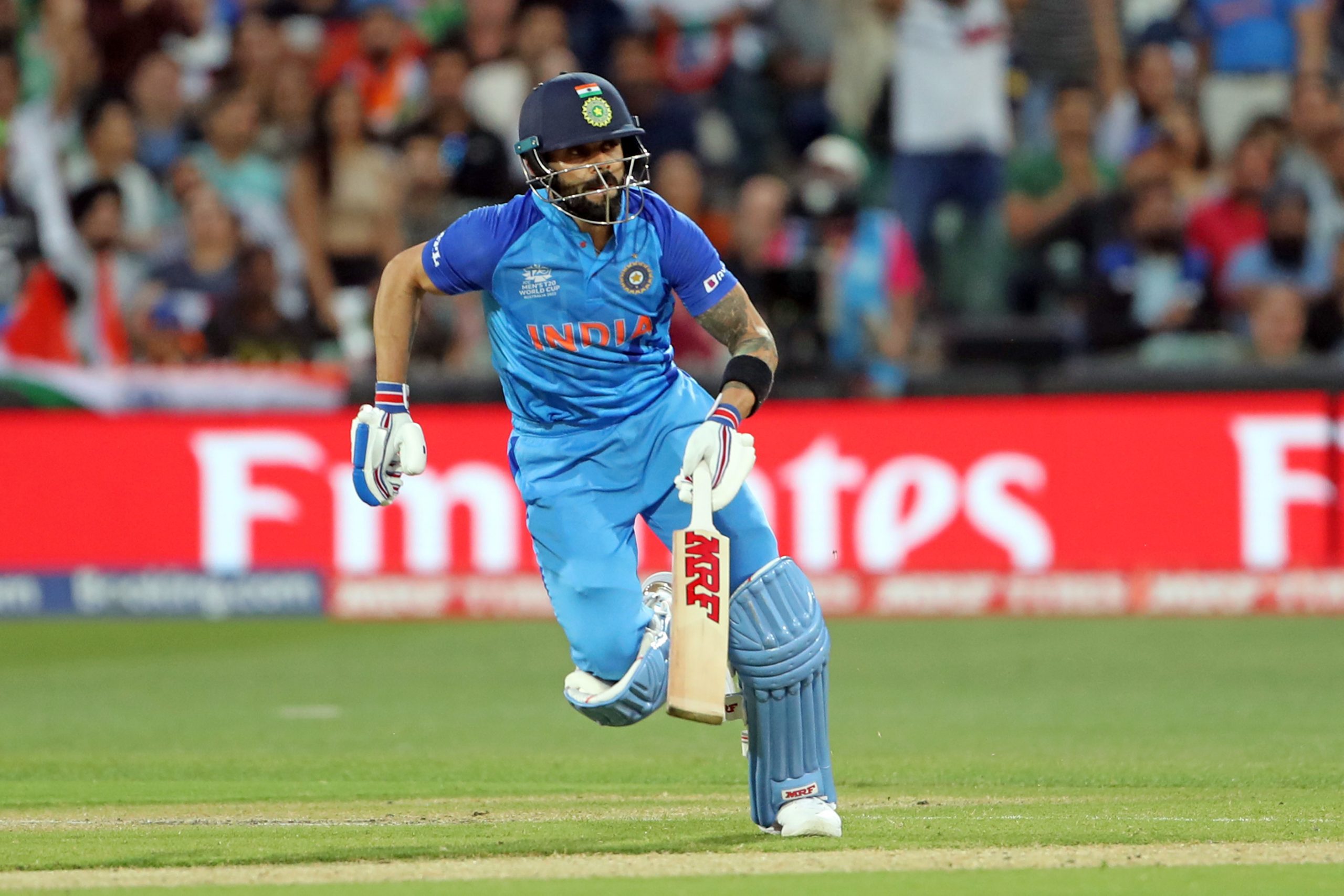 India's Virat Kohli run between the wickets